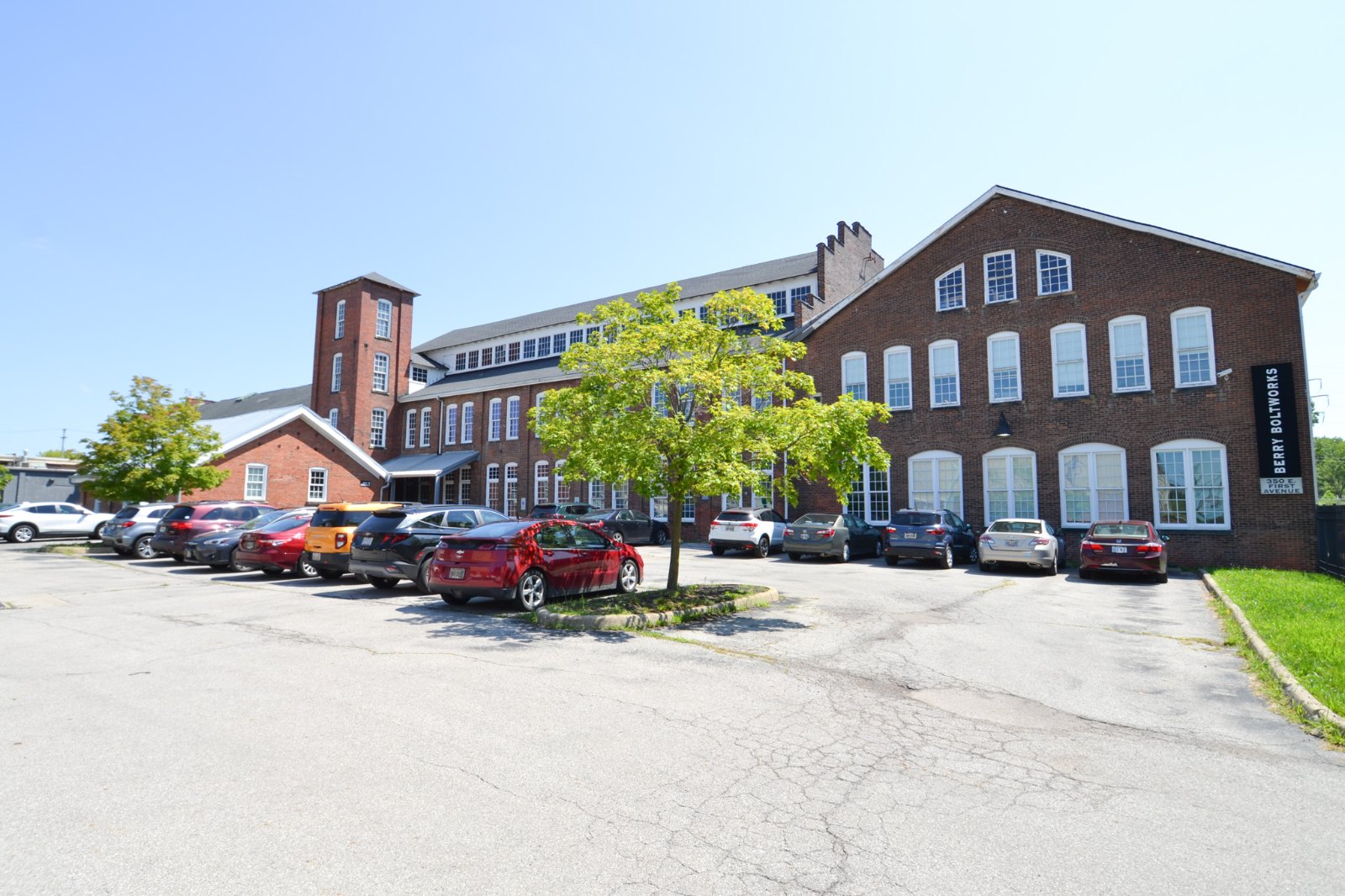 The full First Avenue elevation with the stair tower and on-site parking